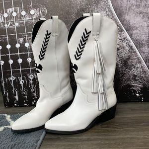 Dressy, white cowboy boots with tassels